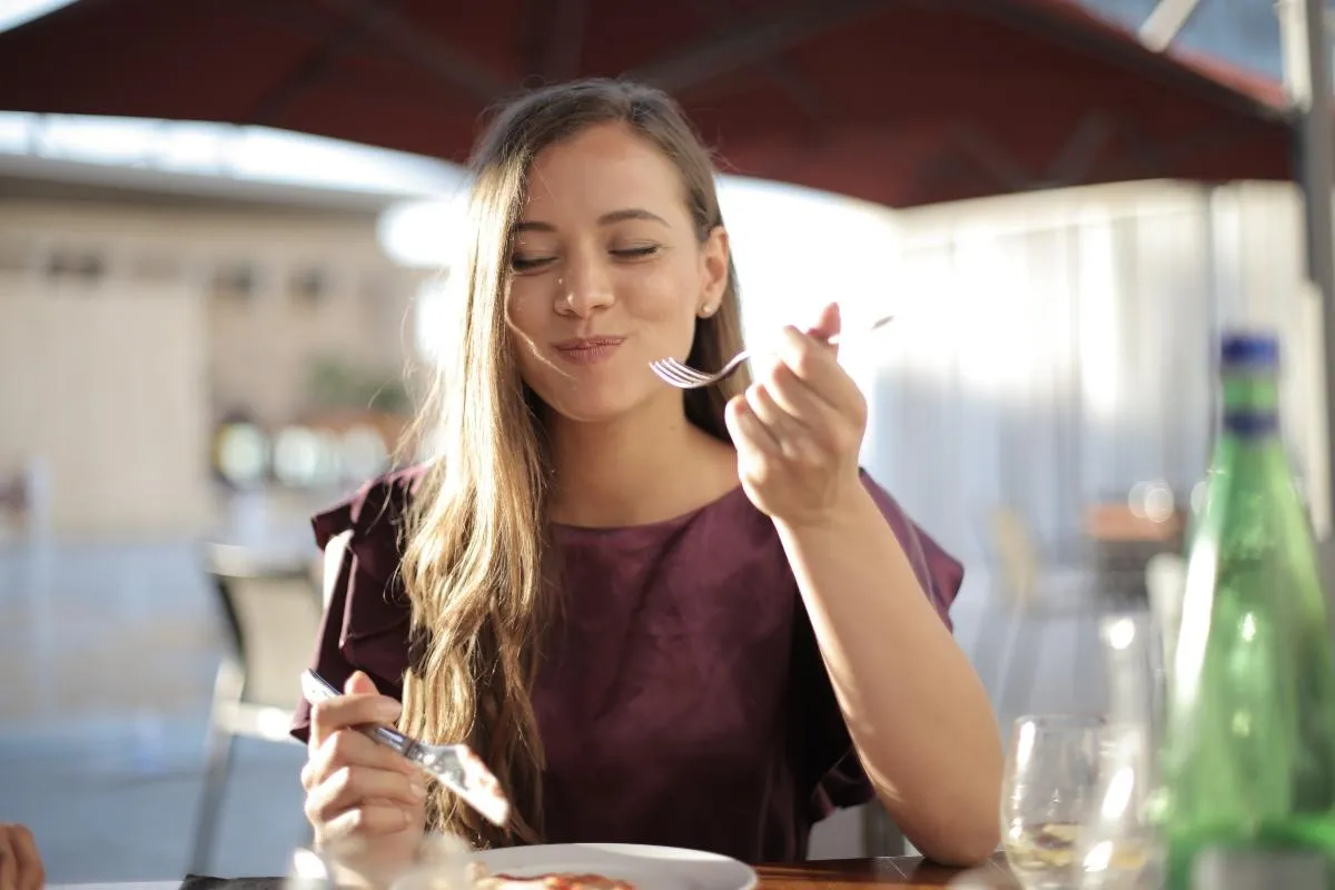 woman eating vegan food