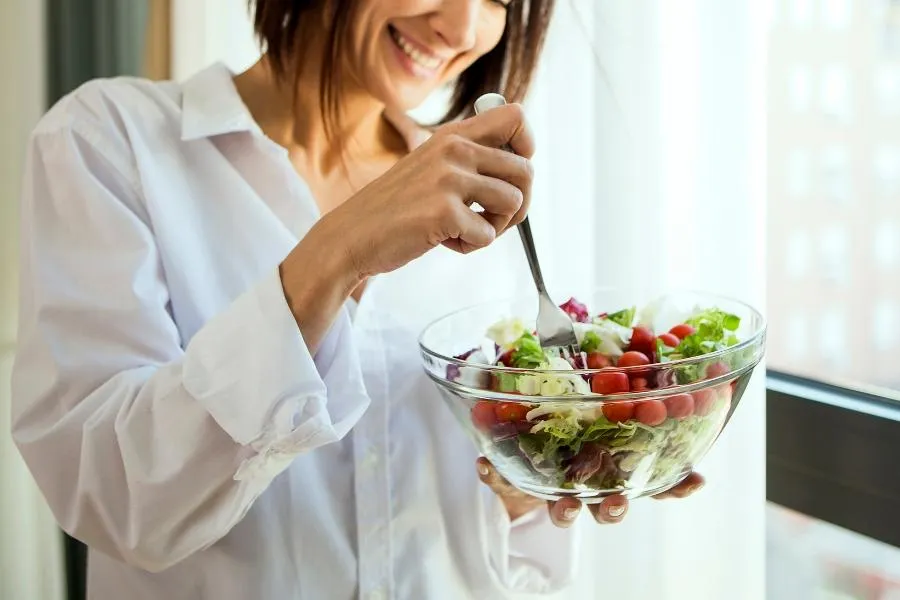 woman eating a salad