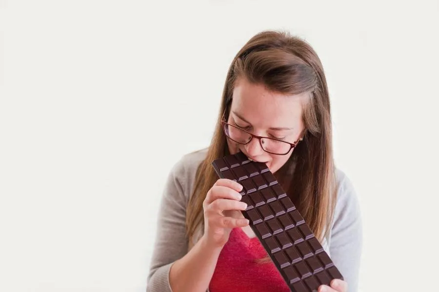 woman eating chocolate
