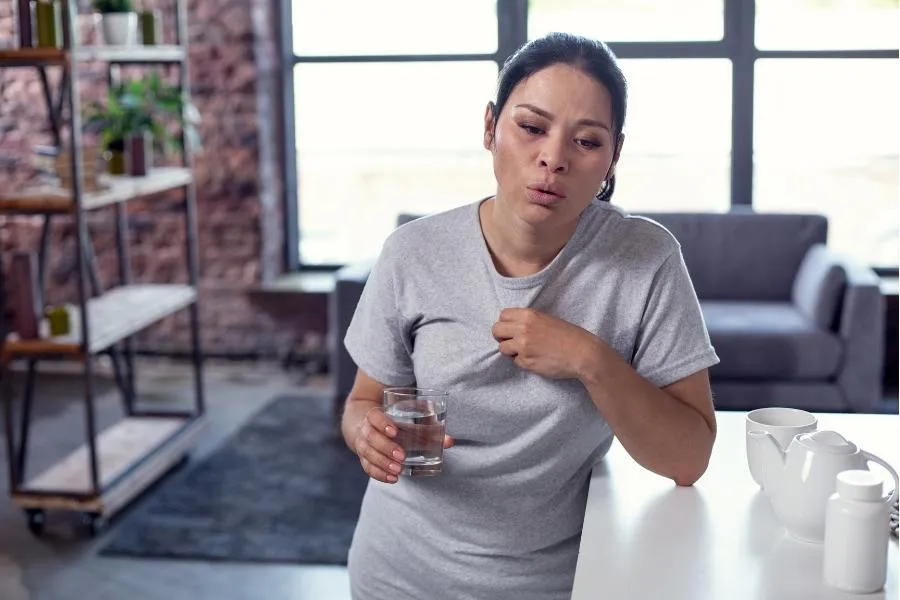 woman having menopausal hot flush