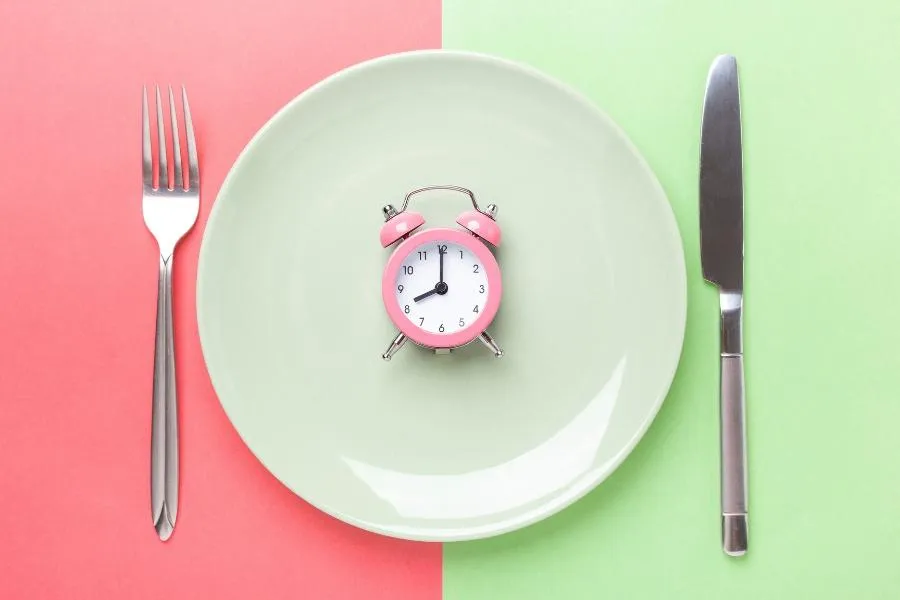 Alarm clock on a plate