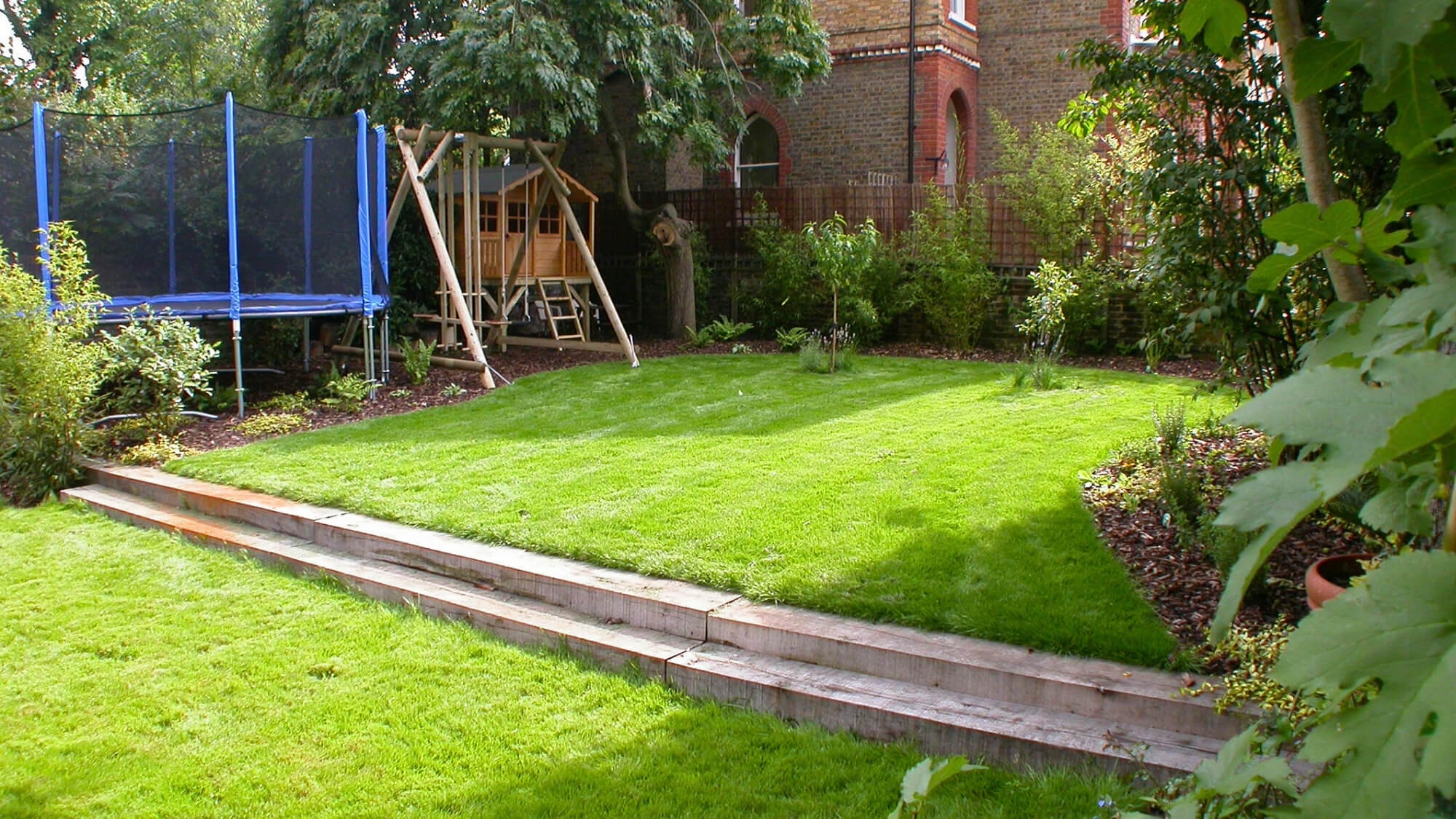 family garden design with lawn and play-friendly layout