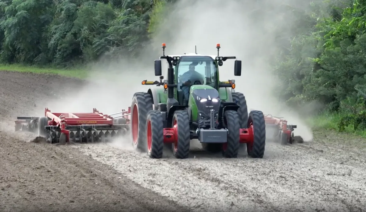 a close up of a tractor tire on a farm