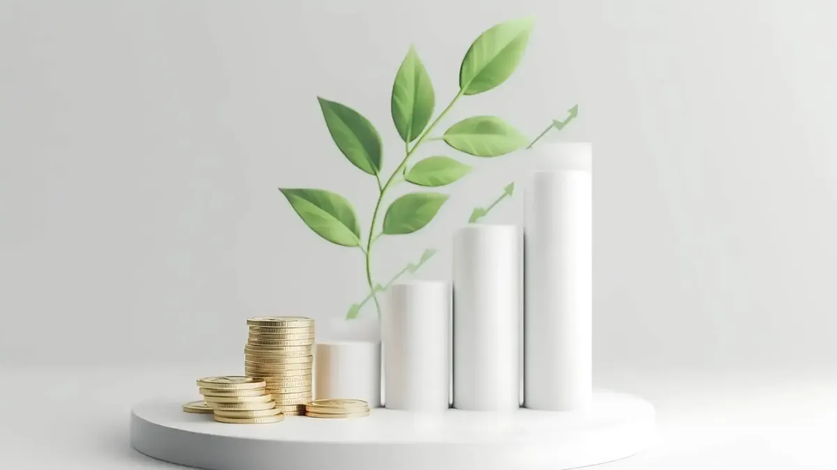 Pièces empilées et pousses végétales symbolisant la croissance du capital et le potentiel de rendement des placements financiers.
