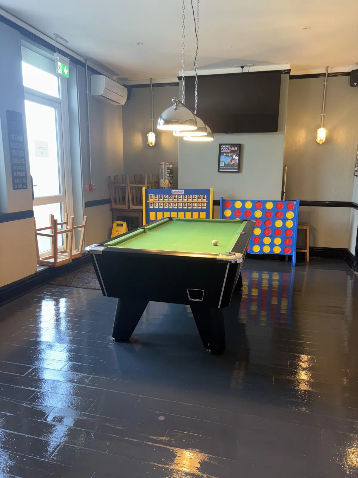 Cleaned pool room and floor at a commercial venue