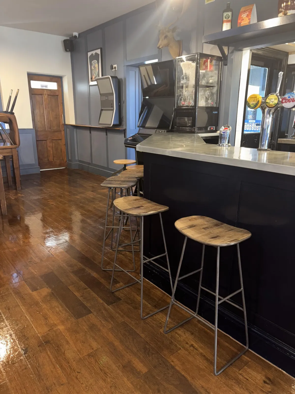 Cleaned bar area and stools after a contract clean