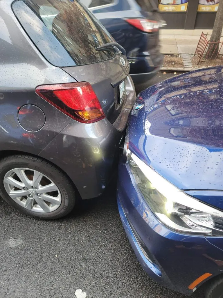 A damaged car after a collision, showing the impact of a serious auto accident. Our Bronx car accident lawyers help victims seek compensation for injuries, vehicle damage, and lost wages caused by negligent drivers.