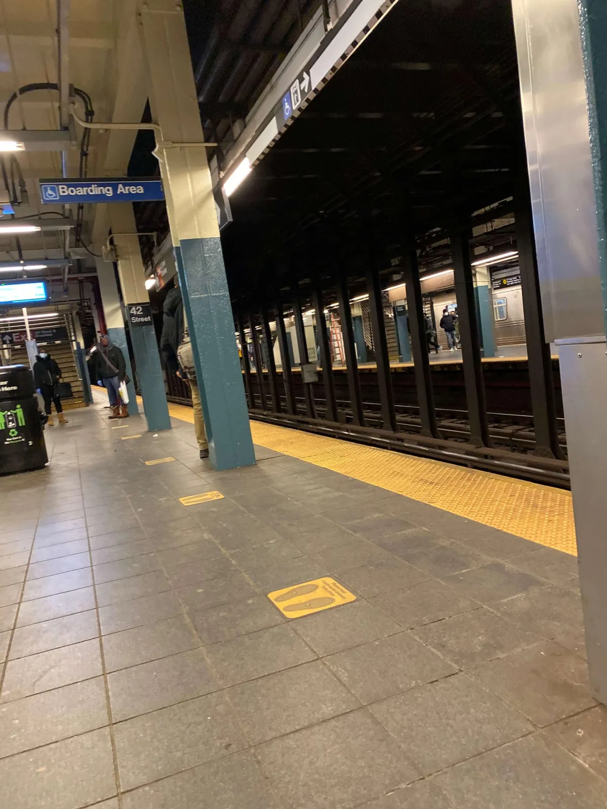 An NYC subway platform representing the dangers of subway accidents, including slips, falls, and train-related injuries. Our Bronx personal injury lawyers help victims seek compensation for subway-related injuries