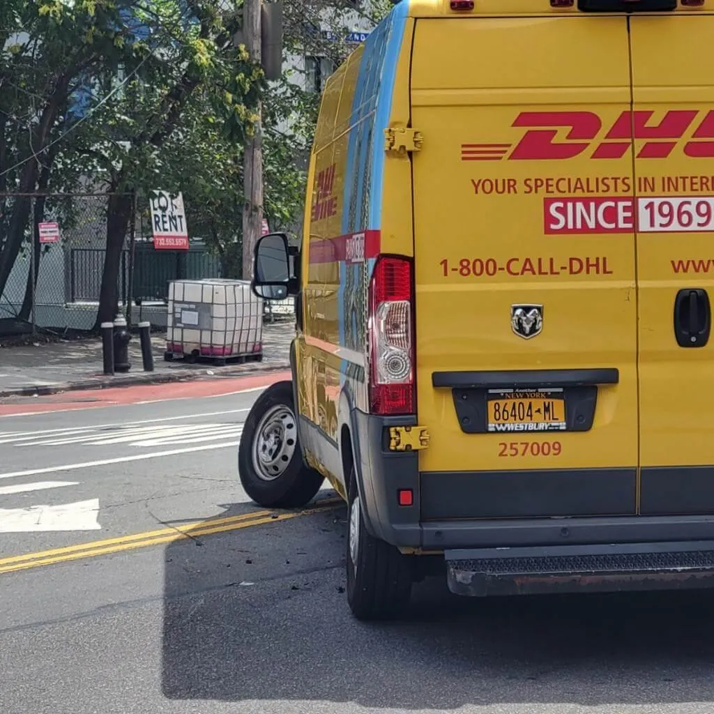 A damaged DHL delivery van in the Bronx, driven by our client, after a serious accident. Our Bronx personal injury lawyers help delivery drivers seek compensation for work-related vehicle accidents and injuries