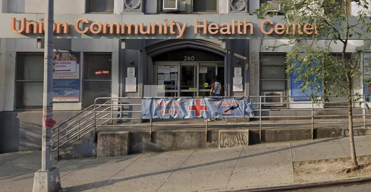 Front entrance of Union Community Health Center — 260 East 188th Street, with signage, ramp, and stairs.