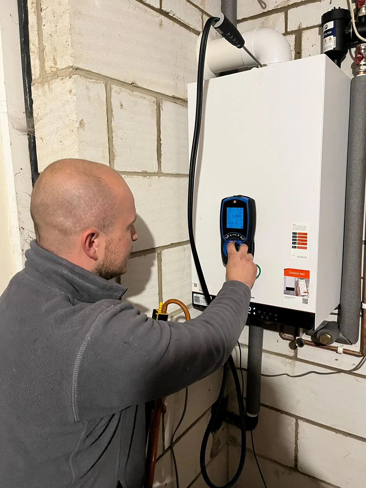 Heating engineer serving a as boiler