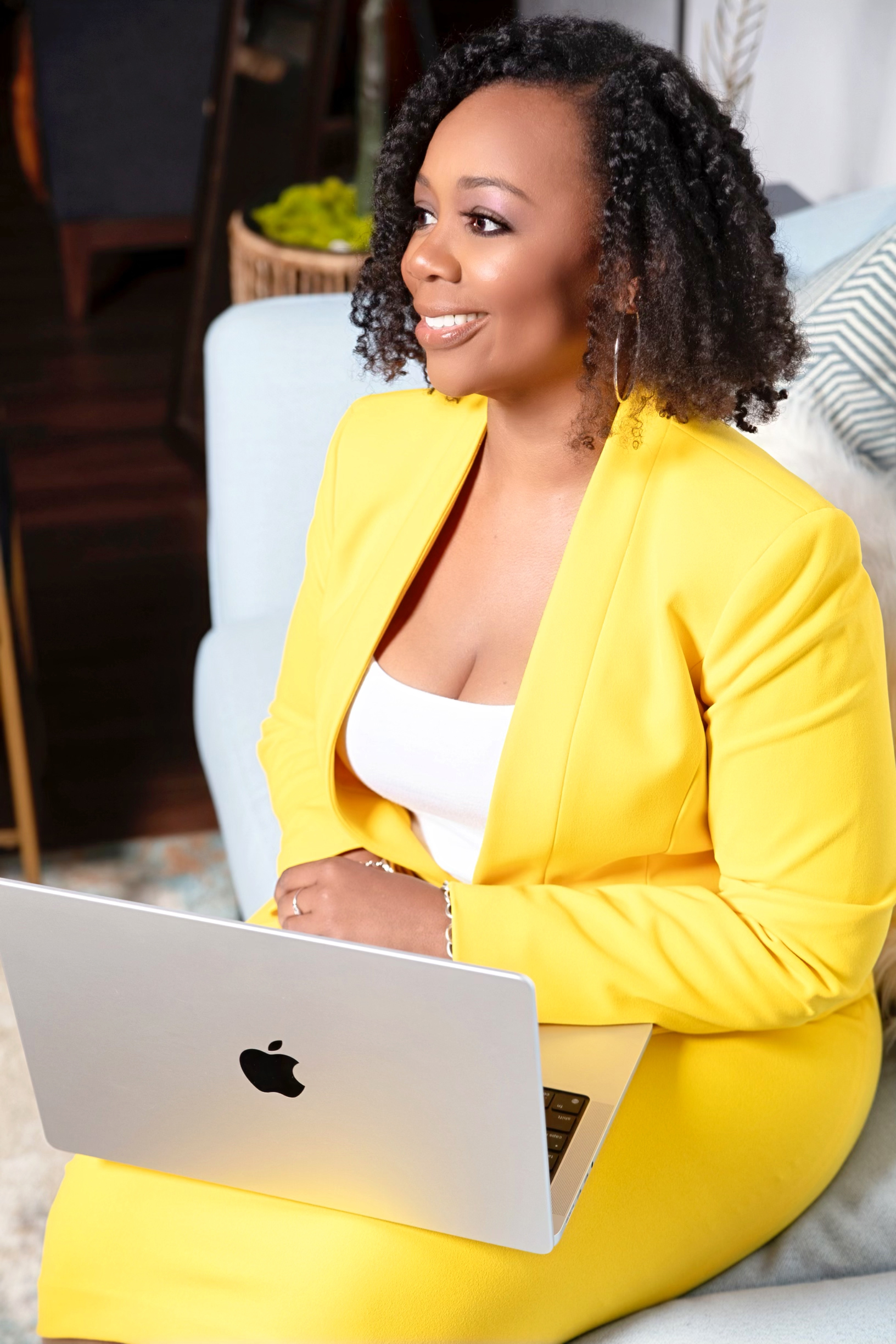short-haired black cat besides brown wooden table