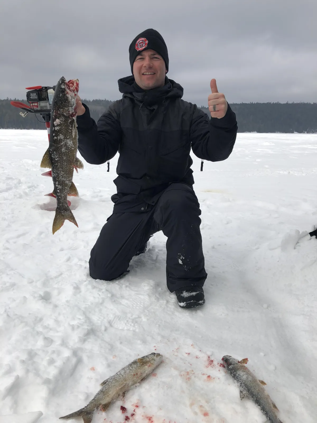 Chief Little Eagle Ice fishing Lake Trout.