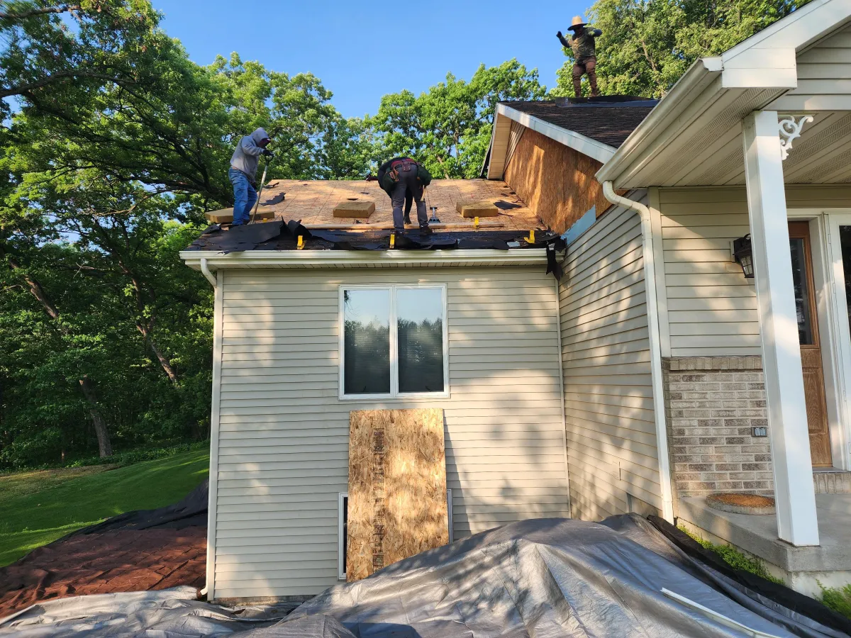 Roofing project in progress by All Service Specialists - Skilled workers installing new roofing materials, ensuring precision and quality craftsmanship for a durable and reliable roof.