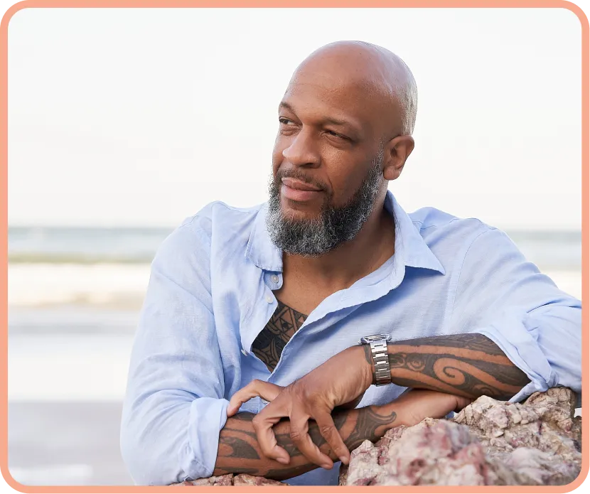 Portrait of SolaraWell lead practitioner, waist-up in warm natural lighting