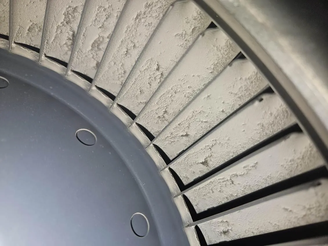 HVAC blower wheel cleaning removing dust buildup from residential HVAC system