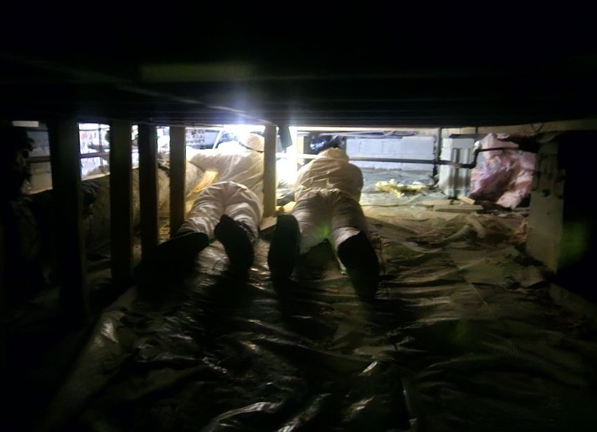 Imagehvac technicians repairing ductwork in crawlspace memphis tn