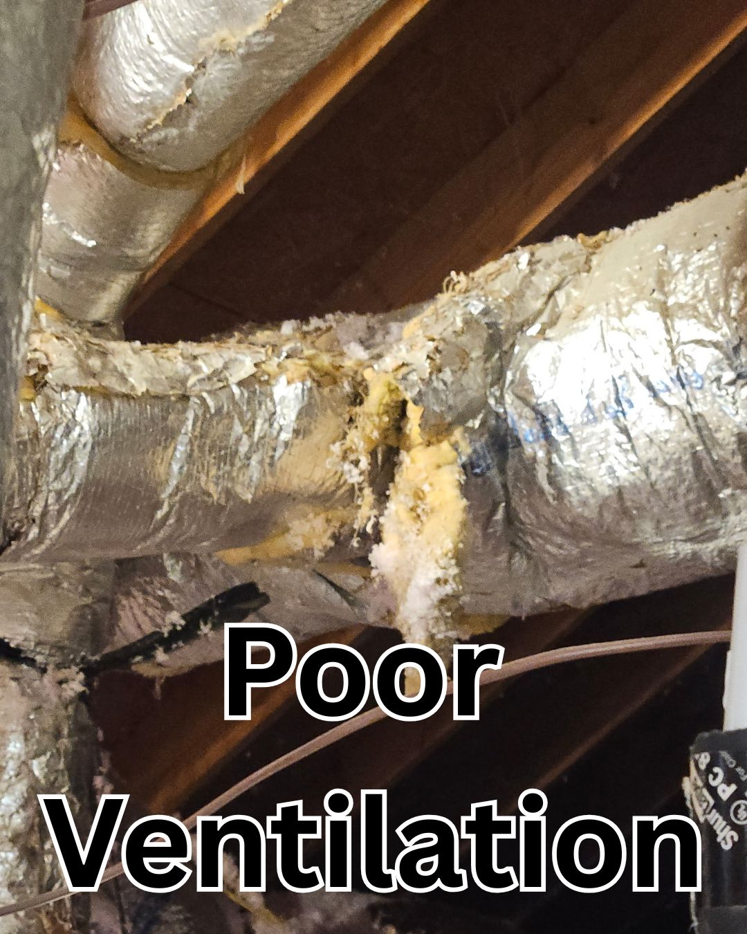 Damaged and poorly installed HVAC ductwork restricting airflow in an attic ventilation system.