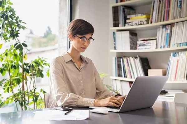 woman working on laptop