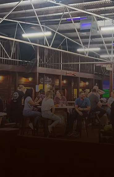 Groups of people enjoying a league night at Wild West Bowling.