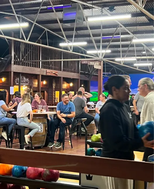 Groups of people enjoying a league night at Wild West Bowling.