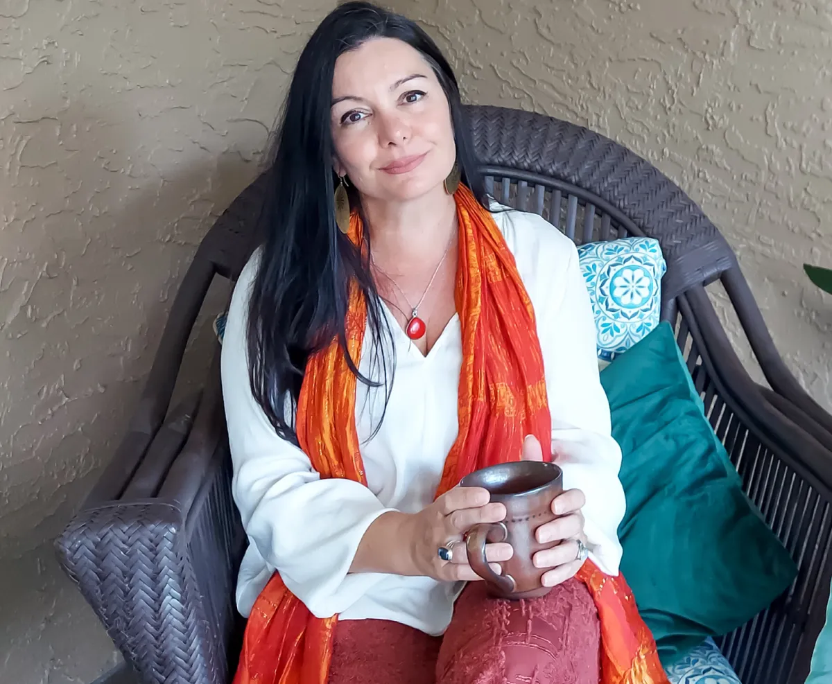 Melanie McCool, The Entrepreneur's Hypnotherapist, relaxed and confident, illustrating how to unlock your money mindset for effortless prosperity.