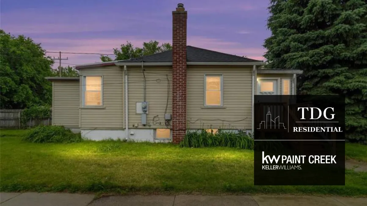 Maintained single-level ranch for sale at 26616 Hampden St, Madison Heights, MI 48071 on a spacious lot with mature trees, listed by The Delia Group.