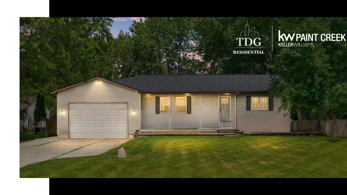 Beautifully maintained ranch for sale at 6459 E Potter Rd, Davison, MI 48423 on a private, tree-lined lot with a covered porch, listed by The Delia Group.