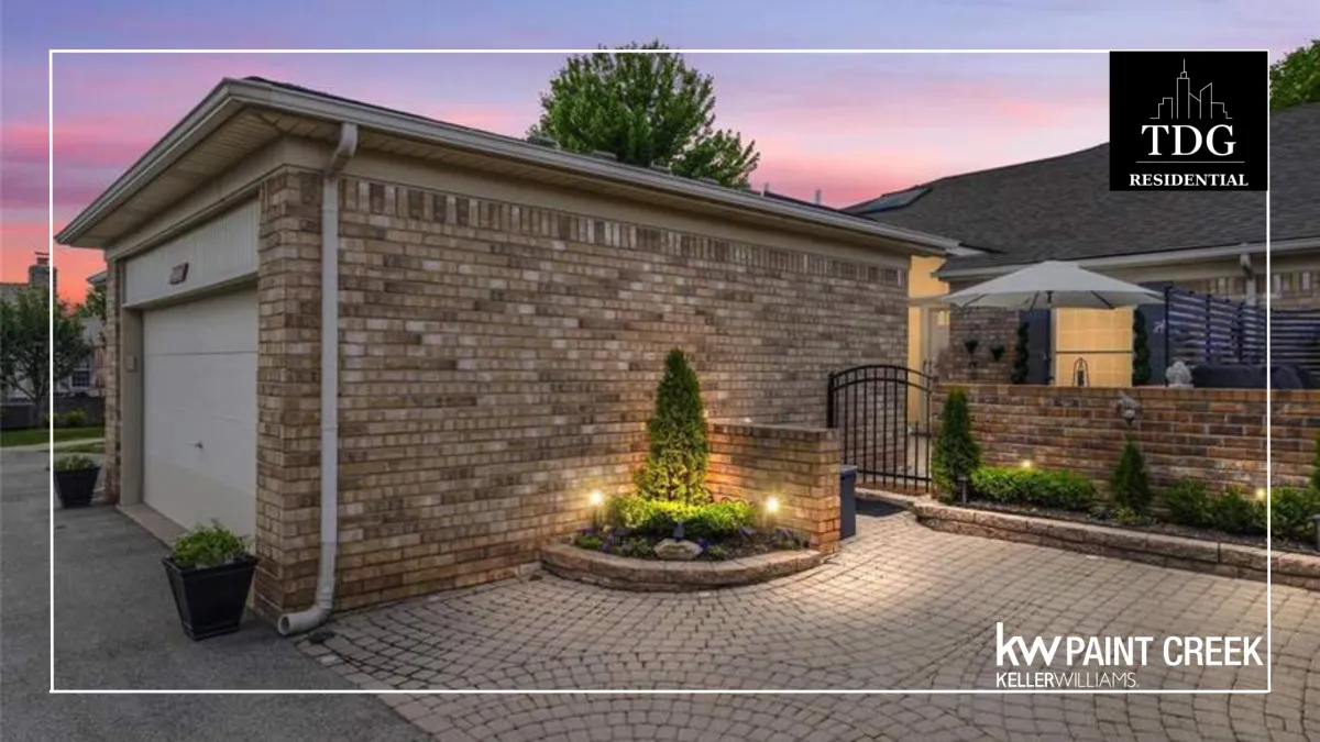 Updated ranch condo for sale at 50311 Highpoint Ct, Macomb, MI 48044 in Highland Hills with a finished lower-level entertainer's space, listed by The Delia Group.