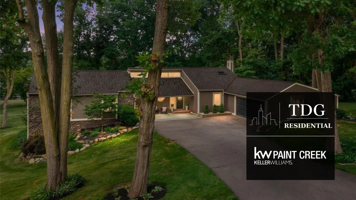 Contemporary ranch for sale at 7148 Deerhill Dr, Clarkston, MI 48346 on a 2.98-acre lot in Deer Lake Farms with lake access, listed by The Delia Group.