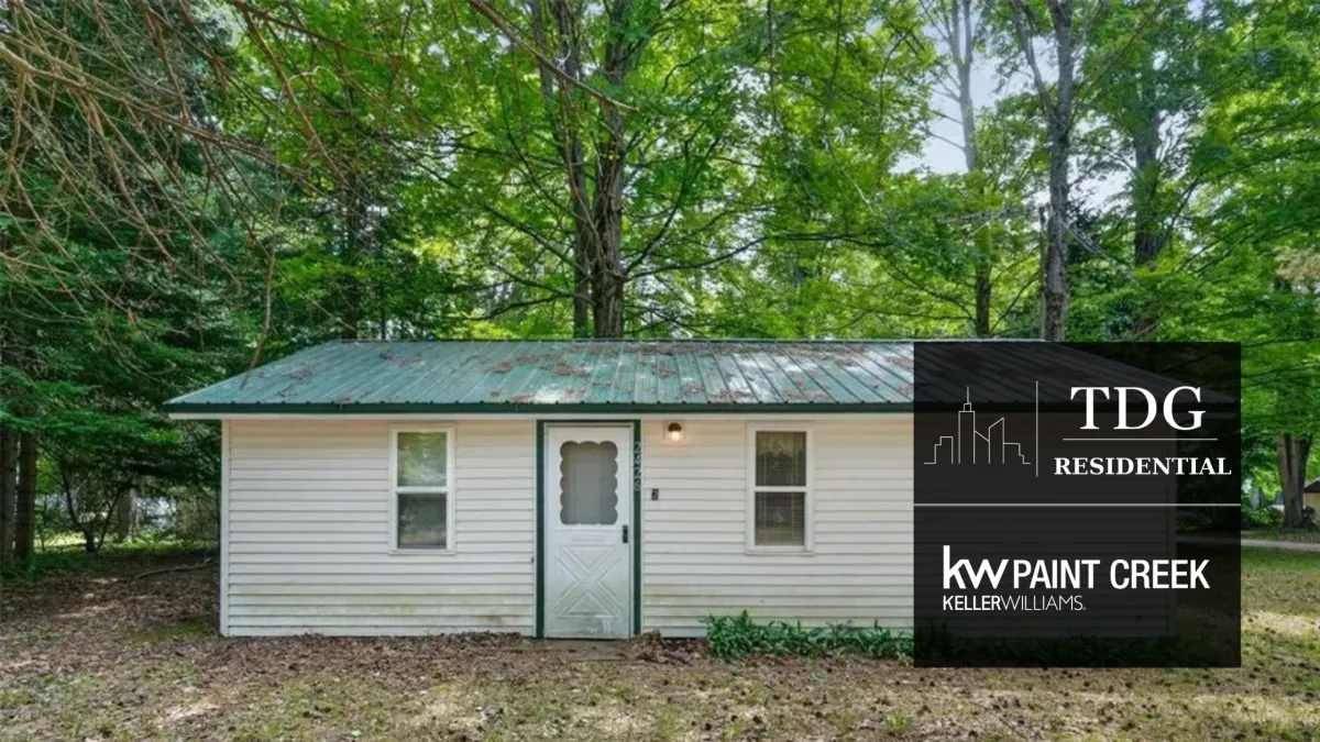 Affordable frame-built ranch cottage for sale at 4450 Beech St, Alger, MI 48610 on 3 lots in the Secord Lake area, listed by The Delia Group.
