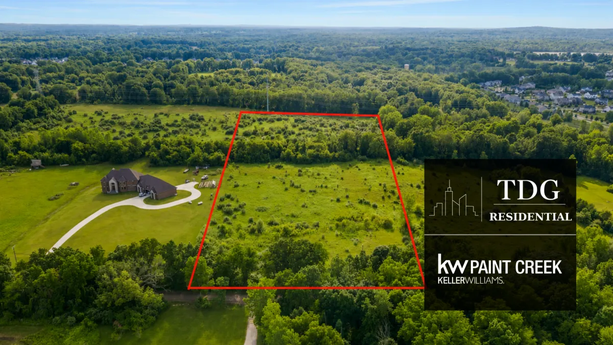 Premier 6.75-acre homesite for sale at 0 Rush Rd, Rochester, MI 48306 in Oakland Township with rolling meadow and panoramic views, listed by The Delia Group.