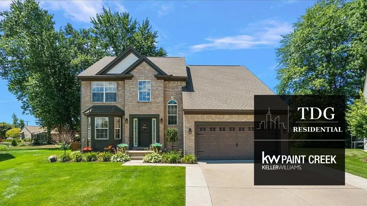 Stunning updated brick colonial for sale at 36317 Dickson Dr, Sterling Heights, MI 48310 in Sterling Heights with new flooring and landscaped grounds, listed by The Delia Group.