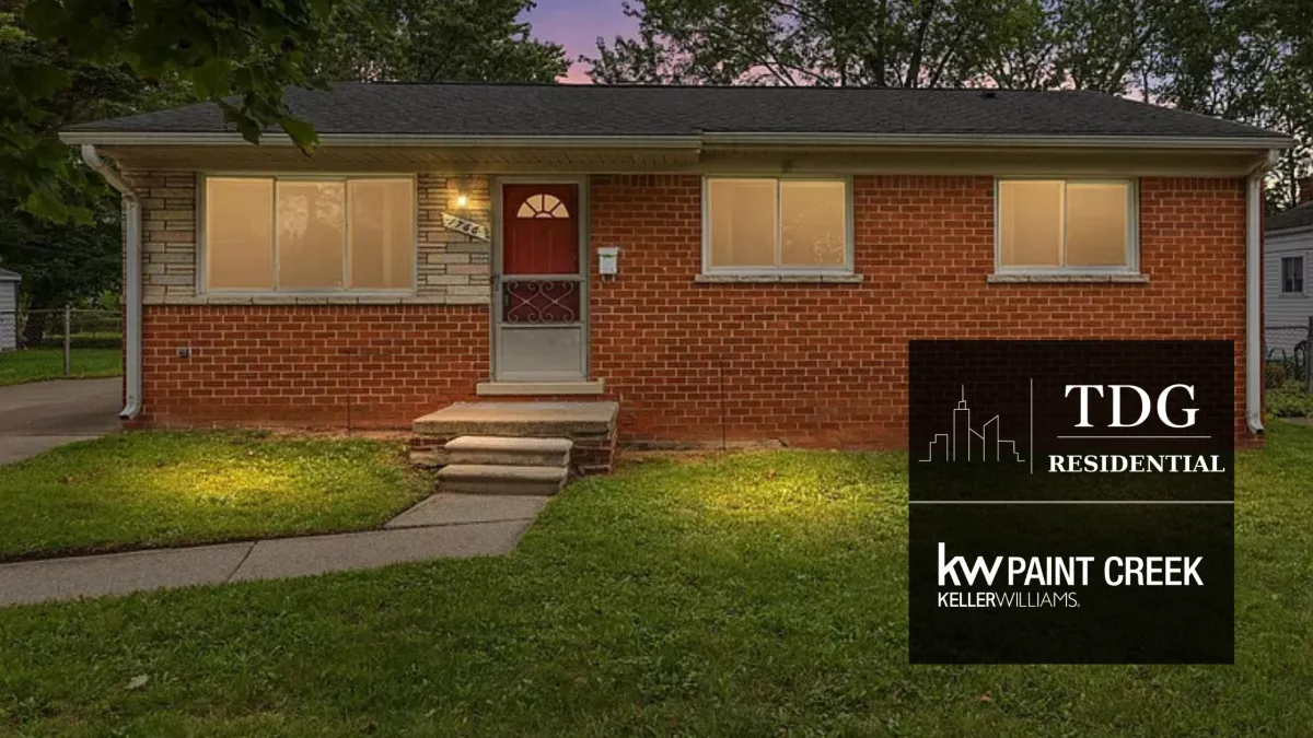 Four-bedroom Garden City home at 1766 Henry Ruff Rd with a finished basement, large backyard, and two-car detached garage, presented by The Delia Group.