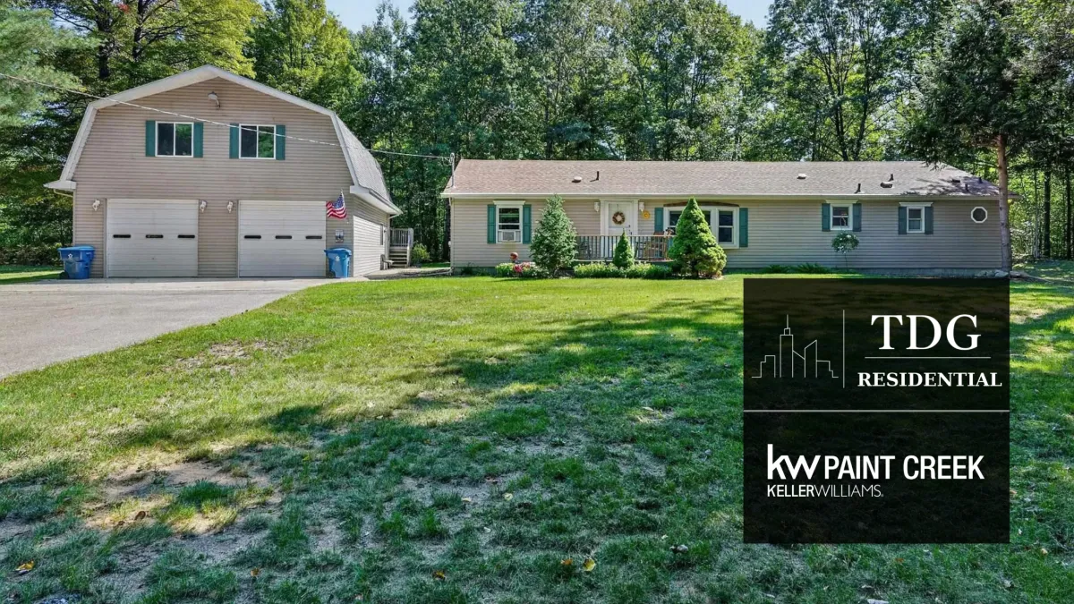 57.5-acre Gladwin recreational compound with an updated three-bedroom home, barn loft, managed habitat, and deeded Secord Lake channel access.