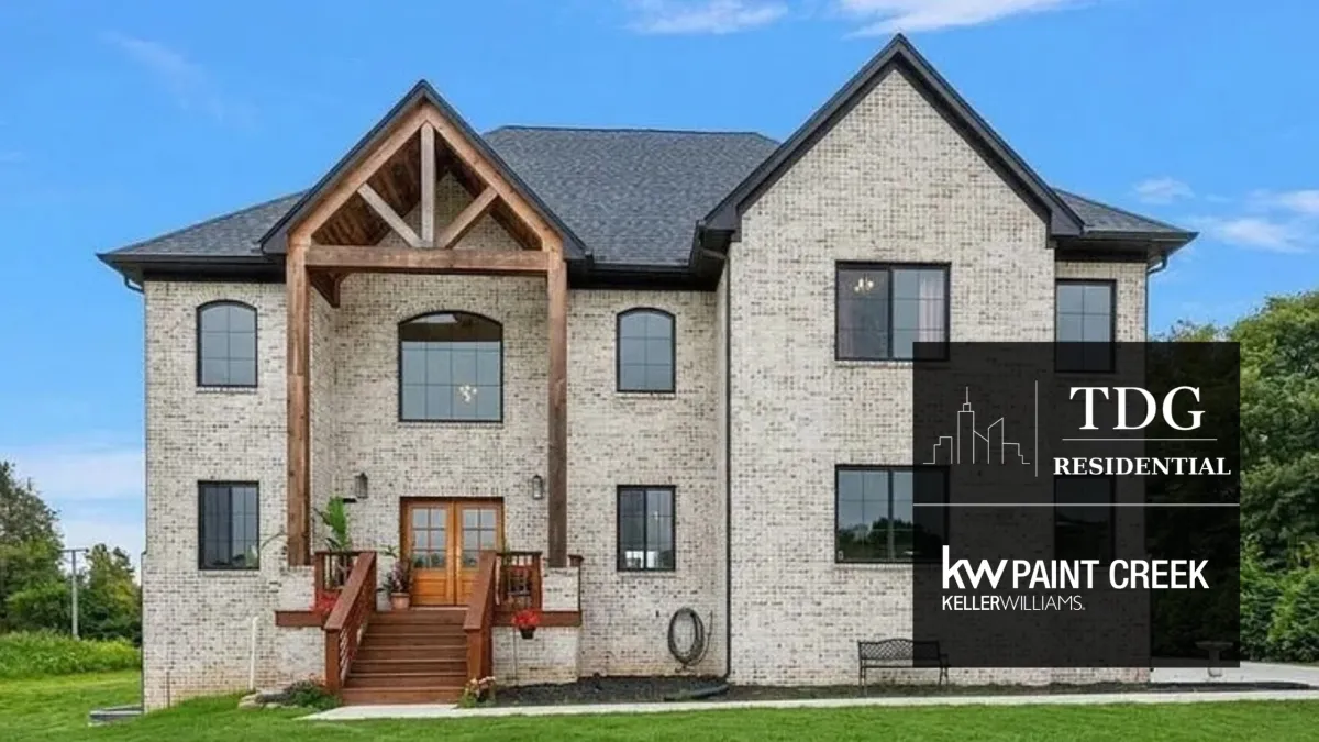 Private Dryden estate with Magnolia brick, cedar gables, three acres, a low-EMF design, private well, and chef’s kitchen.