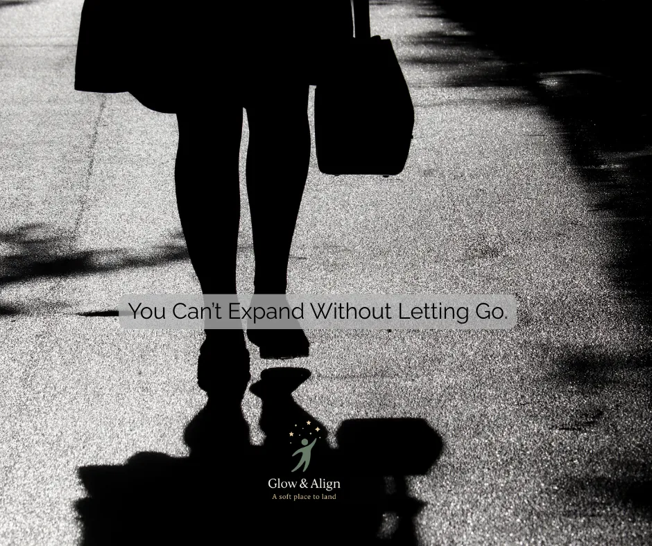 Person walking from shadow into light through minimalist architectural space, symbolizing identity expansion and structural redesign