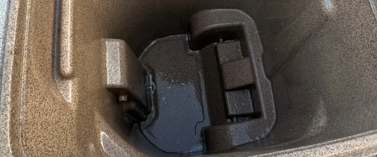 Brown garbage bin shining after a professional wash