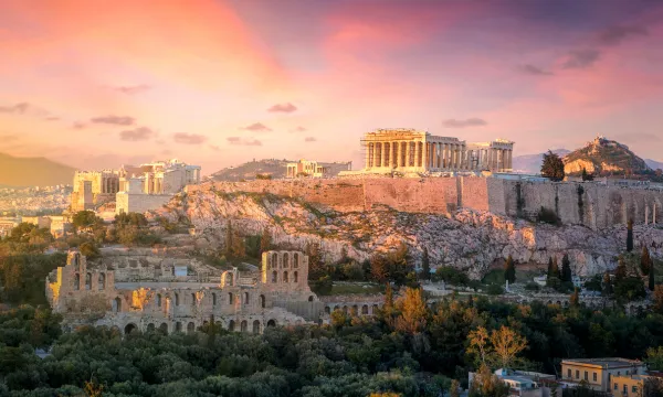 Athens, Greece (Acropolis at Sunset): Marvel at Athens’ Acropolis as the sun sets over ancient ruins and historic charm.