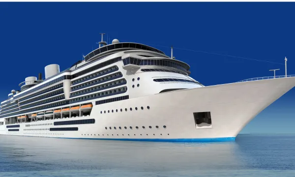 A luxury cruise ship sails through Norway’s Geirangerfjord, surrounded by lush green mountains and snow-capped peaks – a serene and iconic Northern Europe cruise experience.