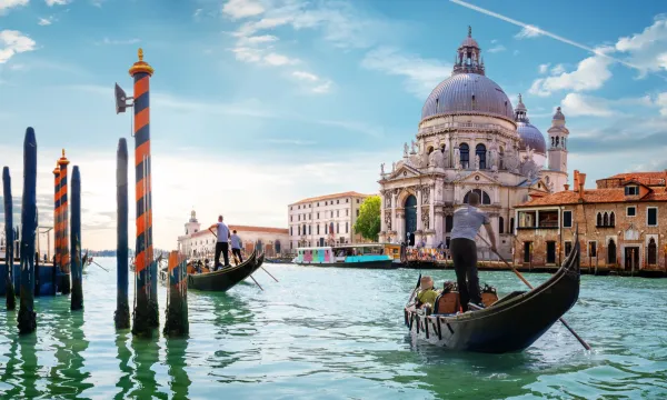 Private Gondola Ride in Venice Glide along the Grand Canal, taking in the timeless romance and history of this floating city.. Cruise from the UK - UK Cruises - Luxury Sassy Cruises