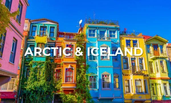 colorful houses in iceland with clear blue sky on an azamara arctic cruise adventure