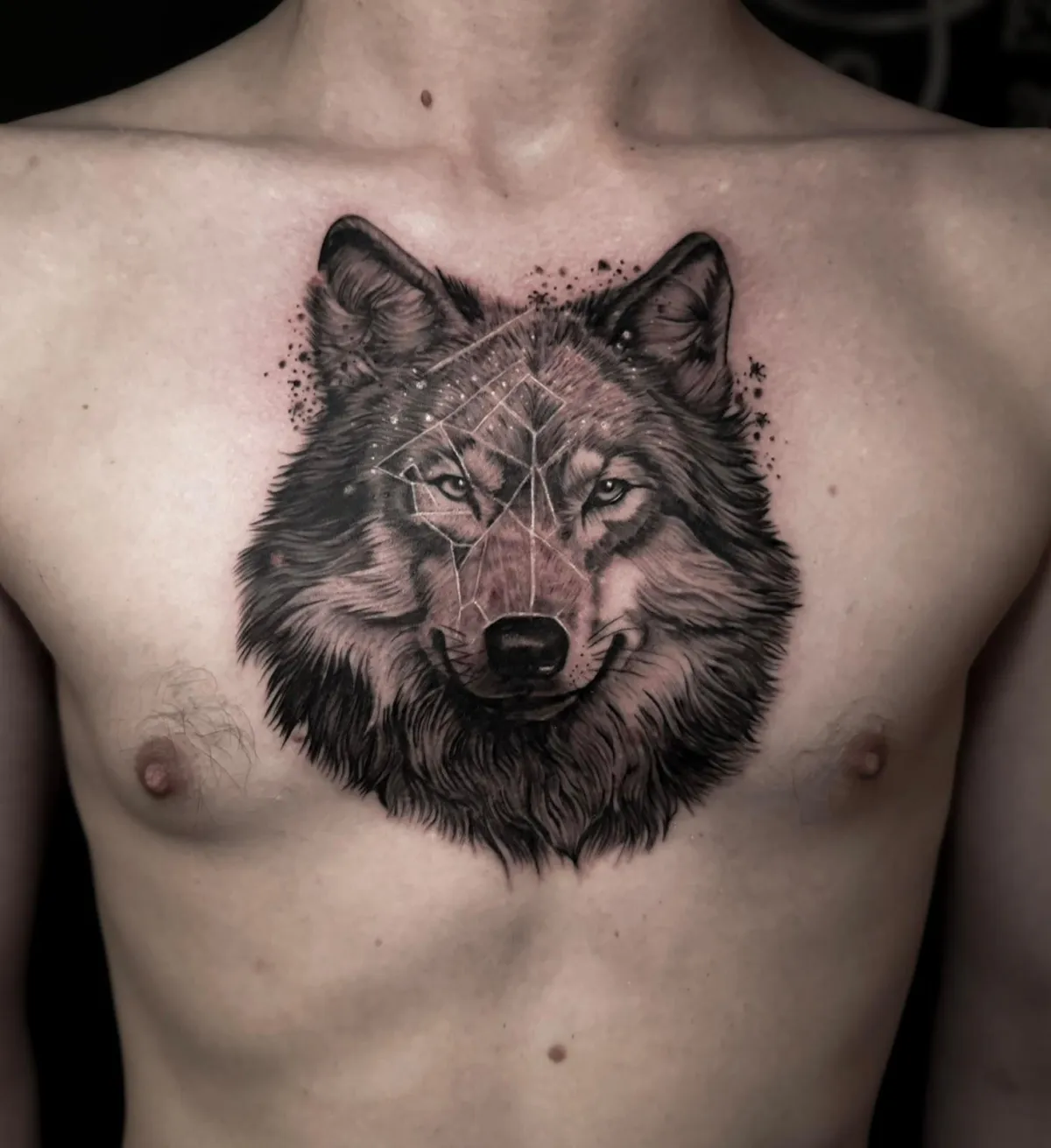 person with tattoo on right arm