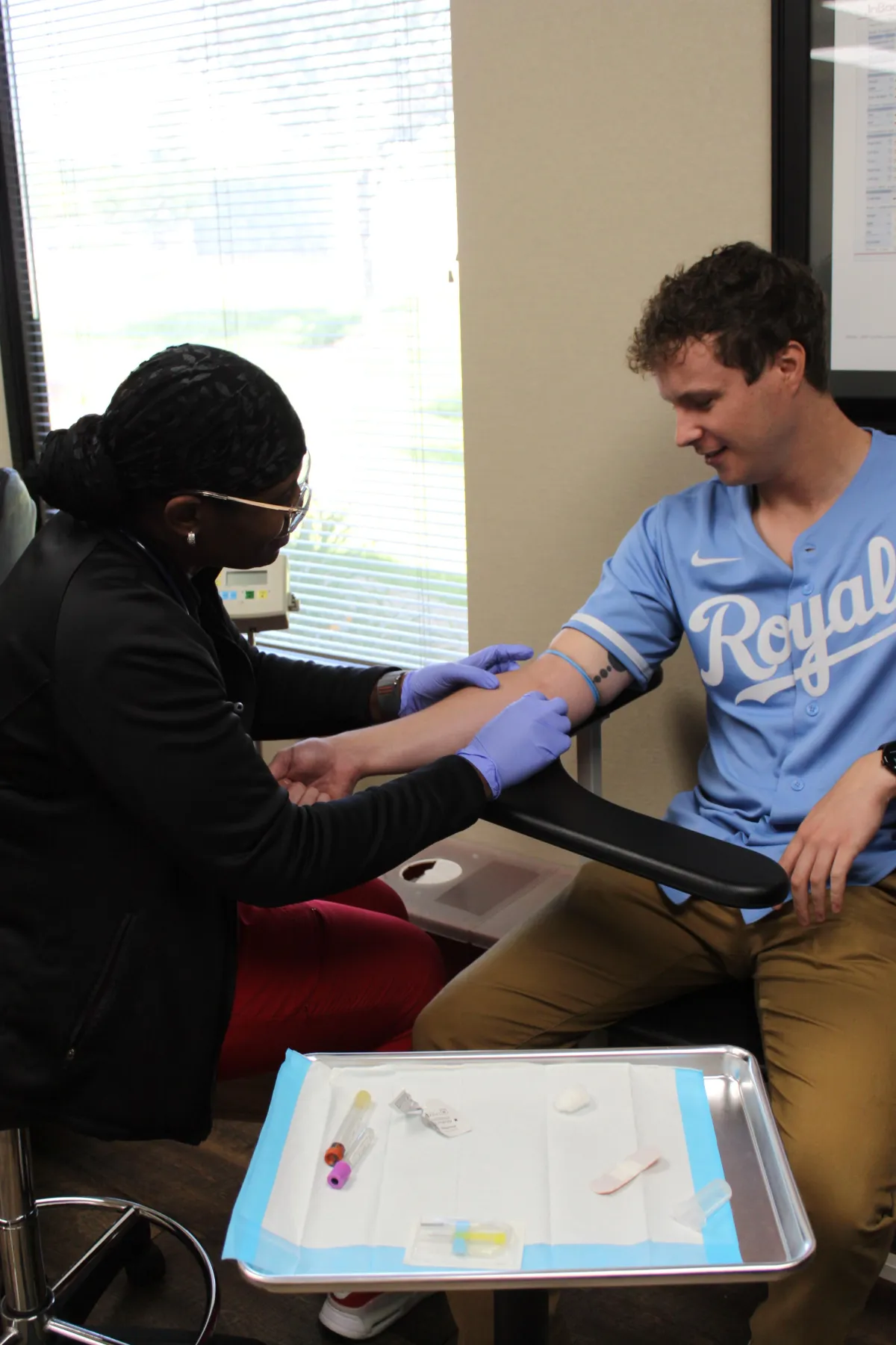 Patient receiving therapeutic phlebotomy blood draw – medical requirements and process for phlebotomy treatment at Hormone Treatment Centers in Overland Park, KS