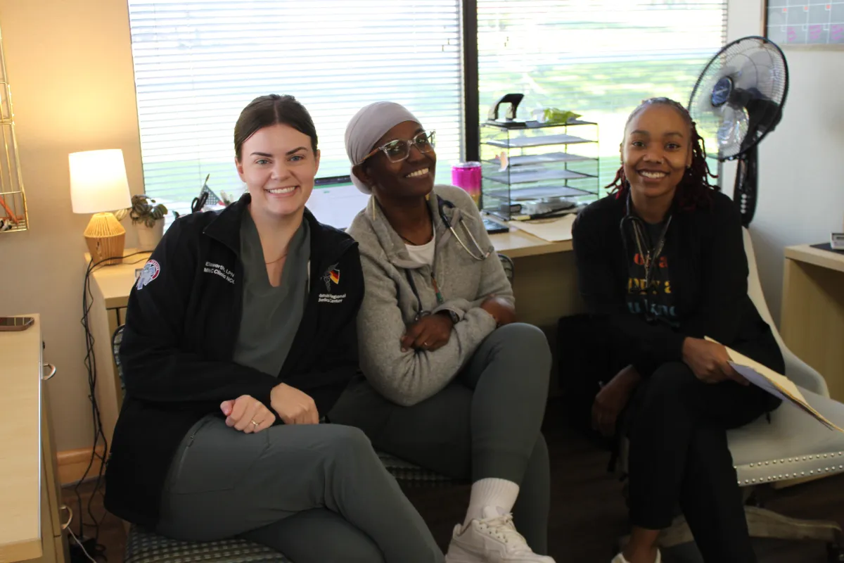 Hormone Treatment Centers of Kansas City medical team smiling in the clinic, representing compassionate and professional hormone therapy care..