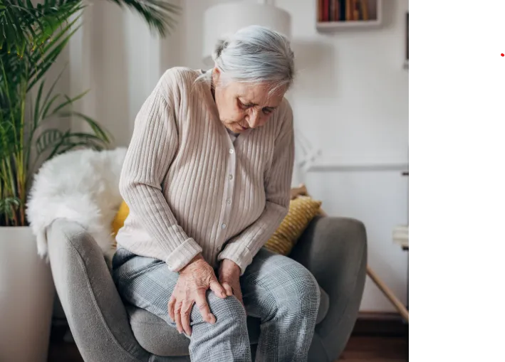 Overland Park woman with knee pain seeking non-surgical platelet-rich plasma therapy for joint regeneration at Hormone Treatment Centers in Kansas.