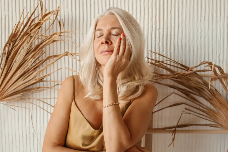 Overland Park woman relaxing after receiving glutathione injections for detox, immune health, and anti-aging benefits at Hormone Treatment Centers in Kansas.