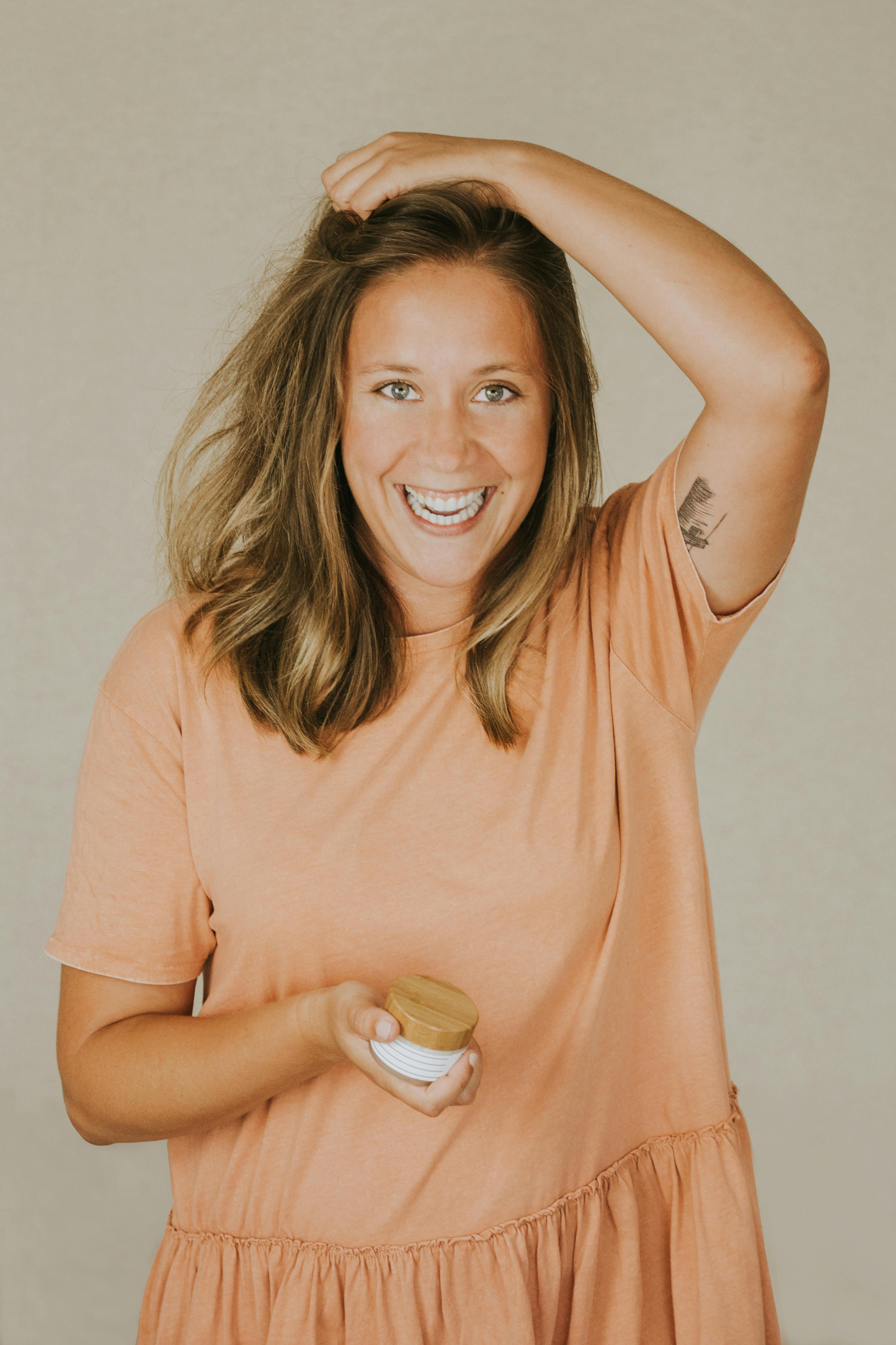 Woman smiling during a perimenopause hormone evaluation at Hormone Treatment Centers in Overland Park, KS and Lee’s Summit, MO