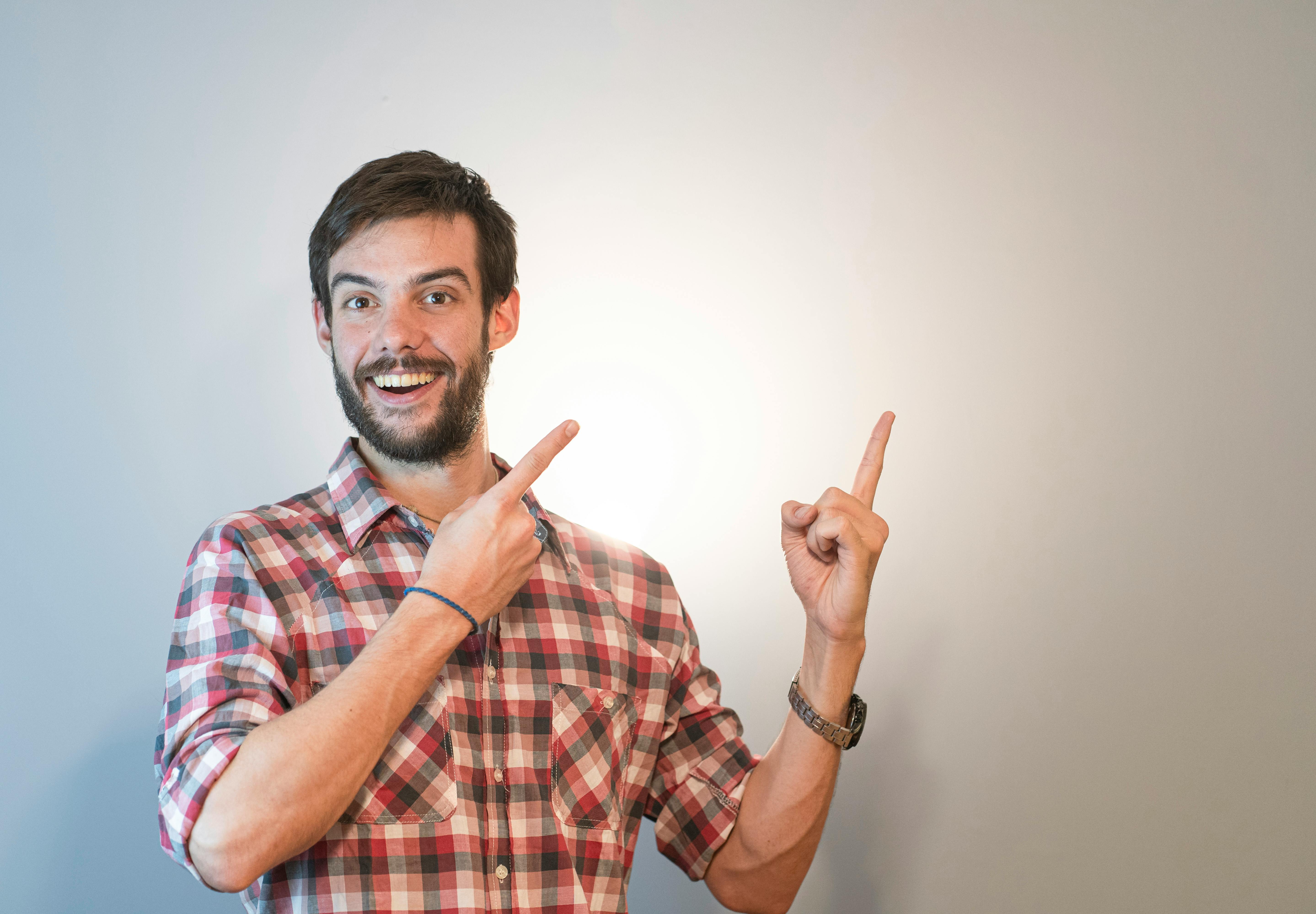 Man holding syringe – Hormone Replacement Therapy (HRT) helps restore testosterone, improve energy, sexual health, mood, and overall vitality at Hormone Treatment Centers in Overland Park, KS & Lee's Summit, MO