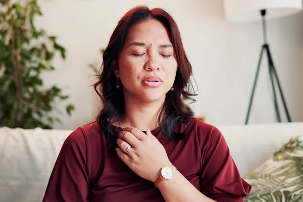 Woman using grounding techniques to calm the brain and body